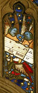 Ventana n2 que representa el coro angelical con partitura musical
