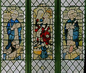 Ventana w4 que representa la Piedad con San Domingo y San Pedro Mártir: pequeñas figuras de donantes de English School