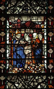 Ventana w58 que representa a Santo Tomás Becket con un prisionero y otras 2 figuras de English School