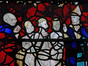 Ventana w6 que representa una escena de una leyenda de San Nicolás: el milagro de los 3 niños: los tres niños en la tina