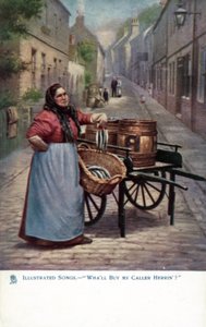 Mujer vendiendo arenques desde un carrito