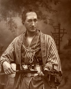 Durward Lely, cantante de ópera escocés, en El Mikado de Gilbert y Sullivan, 1887