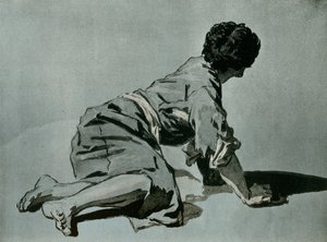 Estudio de un niño en cuclillas en el suelo