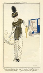 "Chaqueta de terciopelo de pekin negro y castaño sobre una vaina de volantes pintados. Sombrero de terciopelo y aigrette. de Fernand Siméon