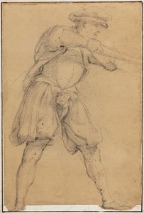 Hombre apuntando con un arma