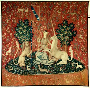 Cortina de la Dama del Unicornio: la vista. Una joven sosteniendo un espejo rodeada de un león, un unicornio, un mono, conejos. Tapiz de lana y seda hecho entre 1484 y 1500. Del Castillo de Boussac, Creuse. Museo Nacional de la Edad Media, Termas de Cluny,
