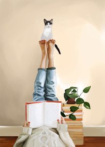 Un gato acurrucado leyendo