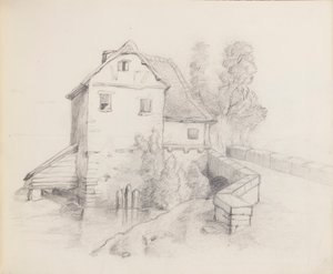 Casa del molino junto a un arroyo