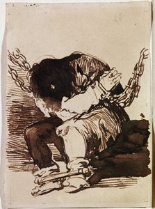 Prisionero encadenado sentado