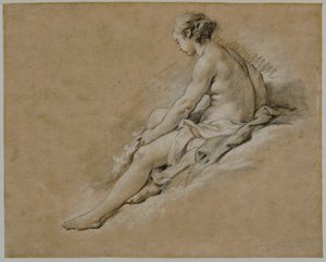 Una niña desnuda sentada