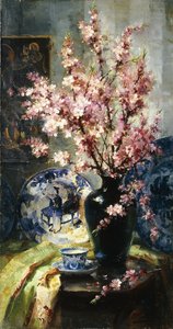 Flores de manzano y porcelana azul y blanca en una mesa de Frans Mortelmans
