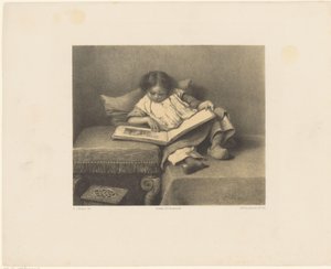 Niño con libro de imágenes