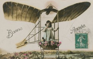 Tarjeta de felicitación de Año Nuevo de una niña en un avión (foto coloreada a mano) de French Photographer