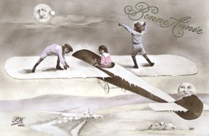 Tarjeta de Año Nuevo con niños en un avión (foto a color) de French Photographer
