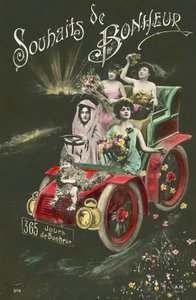 Mujeres lanzando flores desde un automóvil de French Photographer