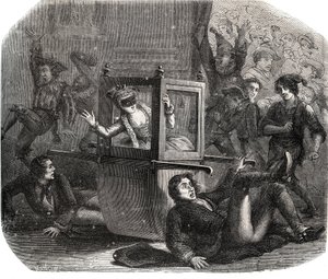 Una banda de bromistas impide que Marie-Thérèse Le Vasseur (1721-1801), disfrazada para el Carnaval, avance en su silla de ruedas. Es víctima de la venganza de uno de sus antiguos amantes. Grabado de 1871 en "Histoire Des Cocus Celebres" de French School