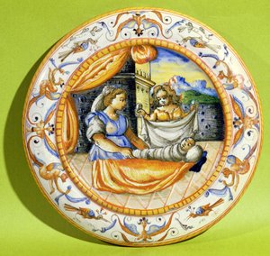 Placa de nacimiento que representa al recién nacido siendo envuelto en pañales, de Lyon (faience) de French School
