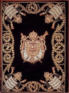 Portada de una de las doce ediciones originales del “Código civil de los franceses” promulgado por Napoleón Bonaparte el 21/03/1804. Está encuadernado en terciopelo bordado de oro y plata con emblema de justicia y armas del emperador. Ley de Derechos Civil de French School