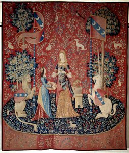 Cortina de la Dama al Unicornio (Dama al Unicornio): alegoría del olfato. Una joven sosteniendo una corona de claveles, rodeada por un león, un unicornio, un mono, conejos. Tapiz de lana y seda hecho entre 1484 y 1500. Del Castillo de Boussac, Cr