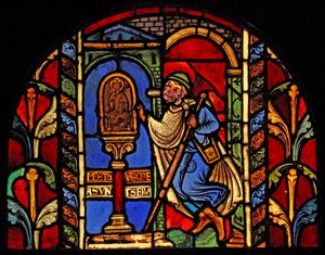 Una escena de la Vida de San Nicolás, ex Catedral de Troyes: un prestatario ha perdido su dinero y va a la estatua de San Nicolás, quien supervisa tales asuntos de French School
