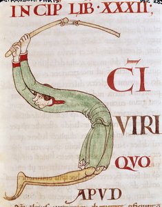 Inicial historiada S que representa a un hombre trillando, del Moralia in Job de Papa Gregorio el Grande