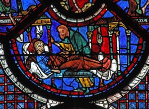 La ventana del Buen Samaritano: el Samaritano atiende al hombre herido de French School