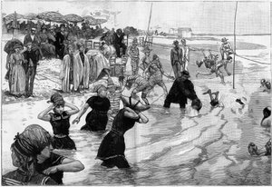 Los baños de mar en el momento de la marea en una playa de Normandía, Francia, en 