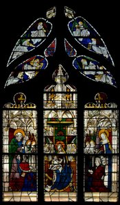 Ventana E3 que representa a la Virgen y el Niño entronizados: también los donantes con sus santos patronos (San Pedro y Santa Bárbara) de French School