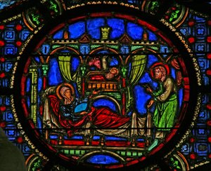 Ventana w0 que representa la Natividad de French School