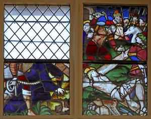 Ventana w107 que representa la Fijación a la Cruz de French School