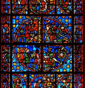 Ventana w10 que representa escenas tipológicas del Antiguo Testamento: los espías y las uvas; David y el pelícano; dos escenas de la Pascua de French School