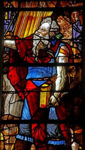 Ventana que representa a Moisés (cabeza moderna) organizando la recolección del maná (algunas figuras son copias de figuras de Miguel Ángel) de French School