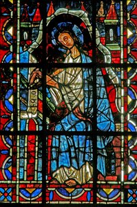 Ventana w202 que representa a San Juan escribiendo el Evangelio de French School