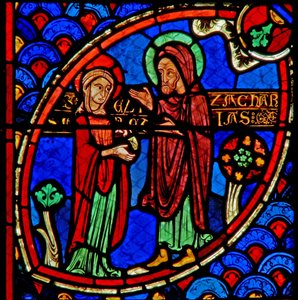Ventana w20 que representa a Zacarías y Isabel, los padres de San Juan Bautista de French School