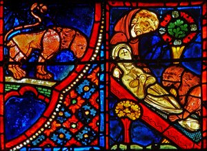 Ventana w21 que representa a un león ayudando a Zósimo a enterrar a Santa María Egipcíaca de French School