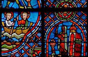 Ventana w23 que representa a San Julián Hospitalario encontrándose con Cristo al otro lado del río cada noche