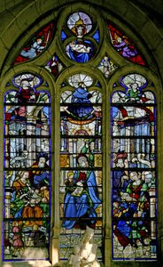 Ventana w6 que representa a Santa Ana enseñando a leer a la Virgen; María Jacobe y María Salomé y sus familias; David, Asa, Josías arriba