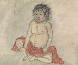 Niño con paño rojo
