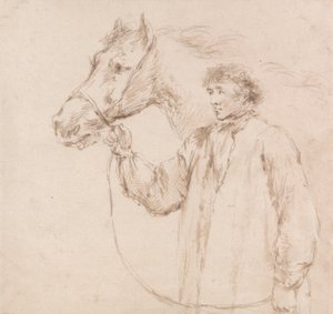 Hombre sujetando al caballo por la brida