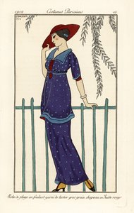 Mujer con vestido de playa de foulard decorado con grandes lunares, sombrero de ante rojo. Robe de plage en foulard garni de tussor gros grain, chapeau en suede rouge. Grabado pochoir (stencil) coloreado a mano según una ilustración de George Barbier de la de Georges Barbier