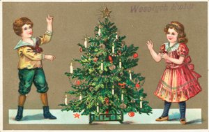 Niña y niño con árbol de Navidad