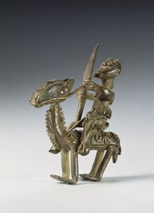 Jinete en caballo con arnés decorativo