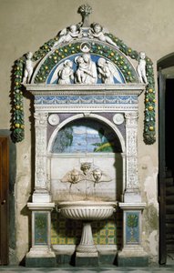 Fuente decorada con altorrelieve en mármol y terracota por Giovanni della Robbia (1469-1529) 1498. Sacristía de Santa Maria Novella, Florencia