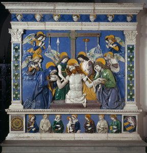 La Deposición de Jesús en el Santo Sepulcro con la Virgen y San Juan Evangelista. Representación de símbolos de la Pasión: látigos, corona de espinas y esponja empapada en vinagre (posca). Alto relieve cerámico por Giovanni della Robbia (1469-1529)