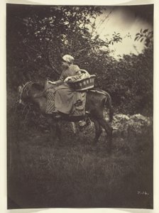 Campesina montando un burro