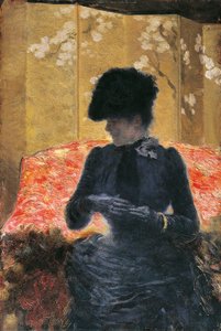 Mujer en sofá rojo