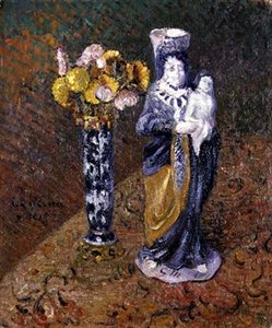Flores y una estatuilla