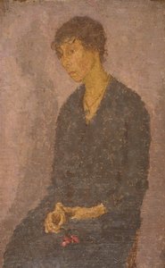 Mujer sosteniendo una flor