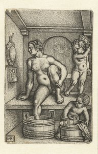 mujer con dos niños en el baño