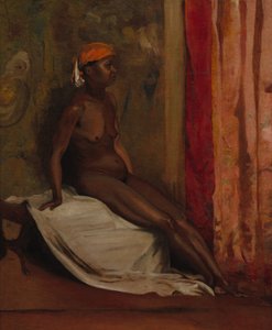 Mujer africana sentada